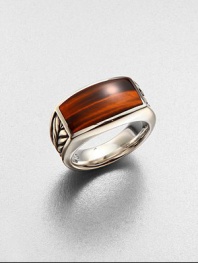 A modern style statement, in sterling silver with chevron detail and highlighted with a tiger's eye inlay.Sterling silverTiger's eyeAbout 1 diamImported