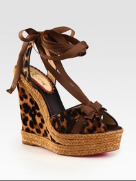 Slingback design of leopard-printed calf hair with leather trim, grosgrain ribbon laces and a chunky espadrille wedge. Calf hair and stacked rope wedge, 5½ (140mm)Stacked rope platform, 1½ (40mm)Compares to a 4 heel (100mm)Leopard-print calf hair upper with leather trim and grosgrain ribbonLeather liningSignaturee red leather solePadded insoleMade in Italy