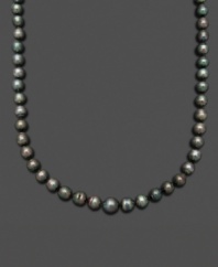 Channel the look of a Tahitian goddess. Belle de Mer's smooth strand of black cultured Tahitian pearls (8-9 mm) completes a look of rich opulence. Set in 14k gold. Approximate length: 18 inches.