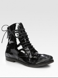Extra long wrap-around laces add urban-cool style to this easy patent leather silhouette. Stacked heel, ¾ (20mm)Patent leather upperBack zipLeather lining and solePadded insoleMade in ItalyOUR FIT MODEL RECOMMENDS ordering one half size up as this style runs small. 