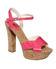 Turn up the volume on summer style. Neon colors and the chunkiest of cork heels make the Yona platform sandals by GUESS hot to trot.