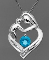 Nothing symbolizes love like a mother and child. This beautiful pendant features a round-cut blue topaz (5/8 ct. t.w.) and sparkling diamond accents. Crafted in sterling silver. Approximate length: 18 inches. Approximate drop: 1/2 inch.