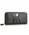 A simple leather wallet with plenty of organizational pockets and zip around closure from Kenneth Cole Reaction.