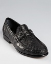 Rendered in authentic crocodile skin for dramatic elegance, these loafers bring the height of luxury to your feet.