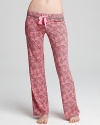 Rest easy in these printed drawstring pants from Juicy Couture.