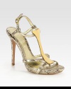 Fronted by a t-strap with goldtone metal plating, this metallic python go-to has an adjustable slingback strap and slight platform. Self-covered heel, 4 (100mm)Covered platform, 1 (25mm)Compares to a 3 heel (75mm)Python upperLeather lining and solePadded insoleMade in ItalyOUR FIT MODEL RECOMMENDS ordering one half size up as this style runs small. 