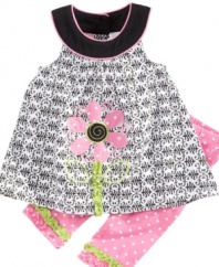 One to grow on. Her beauty will bloom in this precious A-line tunic and polka-dot legging set from Kids Headquarters.