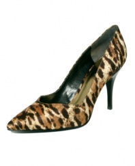Add an explosion of attitude to your look with the Lava pumps by GUESS. A fierce pointed toe amps up the boldness of cheetah-printed silk or eye-catching patent leather.