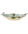 A charming part of any casual landscape, this fanciful Toulouse centerpiece bowl from Fitz and Floyd is brimming with life, from its sculpted blooms and colorful butterflies, to the birds perched on its twig edge.