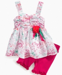 Get a little girlie. Tickle her fancy with this super sweet sleeveless tunic and short set from Guess.