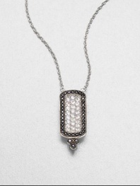 From the Soho Collection. This simply chic features white sapphires and black spinels on a sterling silver link chain. White sapphiresBlack spinelSterling silverLength, about 16Pendant size, about .9Lobster clasp closureImported 