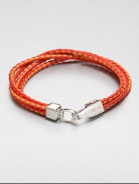 Boldly-hued, braided strands of fine leather are offset by a sterling silver clasp.LeatherSterling silverAbout 2½ diam.Made in the United Kingdom