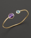 From the Jaipur collection, a blue topaz and amethyst bangle, designed by Marco Bicego.