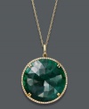 Totally glam in green. This head-turning pendant features round rose-cut dyed-green corundum sapphire (22-1/2 ct. t.w.) and sparkling diamonds (1/3 ct. t.w). Set in 14k gold. Approximate length: 18 inches. Approximate drop: 1 inch. Stones from Brazil.