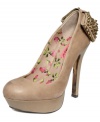 The studded bow on the heel of Betsey Johnson's Zingerr platform pumps adds edge to this otherwise sweet and pretty shoe.