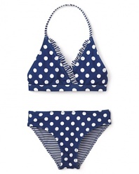 Stripes add high-contrast cuteness to the punchy polka dots on this swim set from Aqua. The bottoms reverse to stripes so she can mix it up.