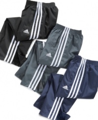 Pull-on sport! These side-striped adidas pants are a classic favorite he'll turn to day after day and year after year.