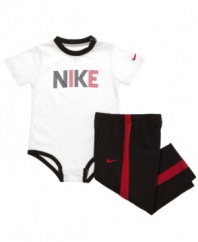 What a sport! He'll look like he's ready to run and play in this athletically-inspired bodysuit and pant set from Nike.