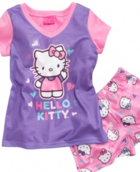 Slumber party! She'll love bedtime with her favorite friend in this shirt and short sleepwear set from Hello Kitty.