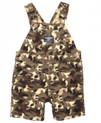 Looks can be deceiving. You'll catch everyone checking out these OshKosh camouflage overalls with hidden dinosaurs, and of course your cute little monster too.