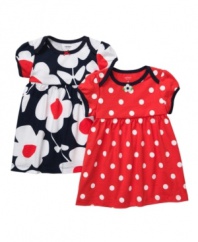 Double the fun. You'll enjoy choosing her outfit for the day when you have options from this two-pack of Carters dresses.