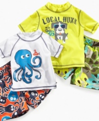 One if by land, two if by sea. No matter where he's at he'll be comfortable and cute in one of these rash guard and board short sets from Carter's.