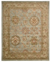For the Jaipur collection Nourison uses a unique herbal wash to create the silky sheen and antique appearance of these fine wool rugs. In stunning aqua with blooms and vines aplenty, the rug enhances your home with lavishly elegant style.