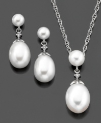 Exquisite cultured freshwater pearls (4-10 mm) dangle glamorously from a sterling silver setting on this enduring pendant and earrings set. Pendant measures approximately 18 inches with a 3/4-inch drop. Earrings measure approximately 3/4-inch.