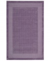 In playful purple, this charming rug will warm up any space in your home. A distinctive center grid gives the rug a delightful texture while coordinating well with casual and modern interiors. Hand-tufted of wool for premium softness and durability.