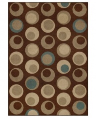 Design shouldn't be uptight--lighten up with the playful graphic feel of the Monterey rug. Mod moon shapes seem to float in space across the chocolate field, tailored to give your home a pleasing contemporary punch.