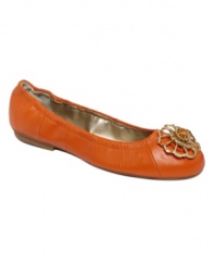Brighten up a casual classic. The Vanna flats by Tahari feature a sparkling floral accent upon their rich leather upper.