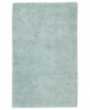 Bring a sensation of serenity to any room with a rich, felted wool rug in soothing spa blue. Hand-woven in India, this luxurious piece lets you in indulge in the supreme softness of plush New Zealand wool.