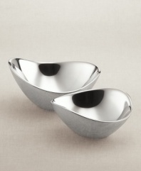 Graceful, imaginative, award-winning contemporary design distinguishes Nambé gifts and collectibles. Each item is designed by an artist as a personal expression of balance in form, beauty in materials, and precise function. The exquisitely simple 7 butterfly bowl is cleanly styled of polished cast metal in an asymmetrical and contemporary shape. Shown on right.