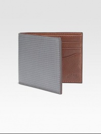 Inspired by the standard geometric graph paper, this leather credit card holder finds the balance between practicality and style.One billfold compartmentSix card slotsLeather4W x 4HImported