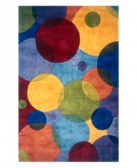 Abstract and absorbing, this rug features a multi-circle pattern in sage, yellow, several shades of blue and burgundy. Reminiscent of beautiful modern art paintings, it adds striking modernity and grace to your home.