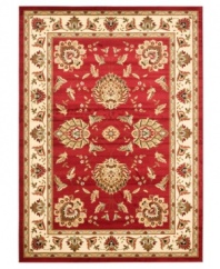 Bring the brilliance of ancient Persian textile design home with this vibrant red Lyndhurst area rug from Safavieh. Crafted from soft polypropylene, this rug radiates timeless allure with the added convenience of easy-care construction. (Clearance)