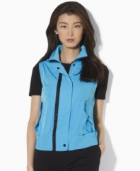 Designed from lightweight microfiber in a bold, bright hue, Lauren by Ralph Lauren's stylish vest features a ventilating mesh interior and sleek hardware for a chic active look.