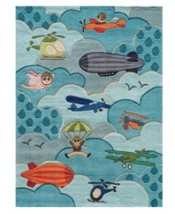 Flight cool! Bring the wonders of the skies down to earth with this bright, quirky and irresistibly adorable area rug from Momeni. Plane, blimps and even pigs are hand-tufted from soft, durable modacrylic, featuring hand-carved details for texture that brings the landscape to life.