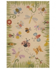 Critters atwitter! Beautify baby's room with this lively rug from Momeni's Lil Mo Classic collection. Ladybugs, dragonflies and other creatures populate this whimsical meadow scene bordered by fresh green blades of grass. The beige background is perfect for showing off the rug's delightful denizens. Hand-hooked of pure cotton, the rug features a cut-loop construction that gives the printed motifs a raised effect and tons of texture.