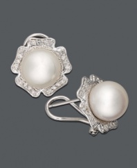 The perfect look for spring -- frame your face with fresh flowers! These pretty stud earrings highlight a cultured South Sea pearl (9-10 mm) accented by sparkling round-cut diamonds (1/3 ct. t.w.). Crafted in 14k white gold. Approximate diameter: 3/4 inch.