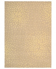 A chic starburst pattern adorns this stylish rug from the Capri collection, offering a unique focal point for any room. Woven of a blend of fine wool with Nourison's signature light-reflecting Luxcelle™ fibers, the rug's soft beige shade and luminous appearance complement a range of decors. (Clearance)