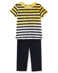 A uniquely designed mineral dip tee combines with solid contrast pants for a fun, hip look perfect for afternoon play.