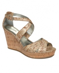 Shore up your shoe collection with the sassy Jersey wedge sandals by Alfani. Chic criss-crossing straps with exotic prints and a natural cork wedge make for the perfect night out.