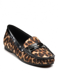 KORS Michael Kors gives penny loafers a wild makeover with leopard print microsuede and glossy trim.