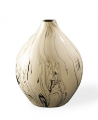 Big on style, this Howard Elliot vase boasts a rounded silhouette and swirling black glaze in off-white ceramic. No flowers necessary.