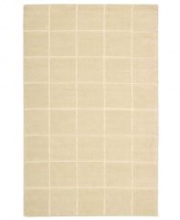 An a-tonal blocked design in luminous ivory creates a sophisticated, modern accent in the Westport area rug from Nourison. Hand-tufted in  India of pure wool for premium softness and durability.