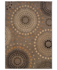 Dream weaver. The Pinwheel area rug from Sphinx incorporates a soothing, earthy palette with a few pops of sweet color all in a mesmerizing and detailed design. Woven of durable, long nylon fibers that also offer a soft hand, it serves to enliven any space with beautiful movement.