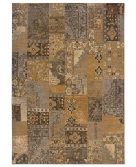 A lively collection of earthy and gold tones are arranged into an intricate patchwork in this Salerno area rug from Sphinx, transforming traditional designs into a uniquely modern focal point for any room. Made in the USA of space-dyed nylon for high color recognition and easy cleaning.