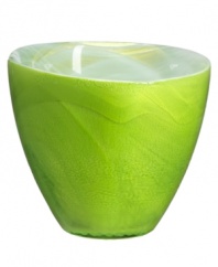 Vivid swirls and strokes of eye-catching lime drape Candy green giftware in a sweet celebration of color. An askew rim gives admirers a peek inside Sea Glasbruk's minimalist glass votive.
