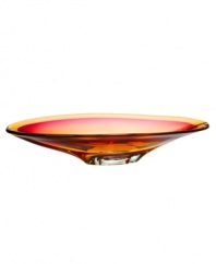 Like a blazing sunset over the tropics, this Vision dish from Kosta Boda brightens a room in an eye-catching combination of amber and pink. Luxuriously crafted art glass flows in a bold, elongated shape to match the striking palette.